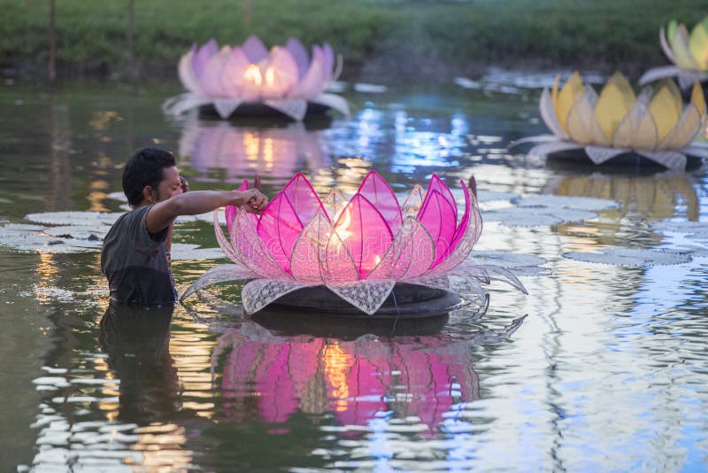 A giant Krathong at the Loy Krathong Festival in the Historical Park in Sukhothai in the Provinz Sukhothai in Thailand. Thailand, Sukhothai, November, 2018. Giant floating lantern stock images, royalty-free photos and pictures