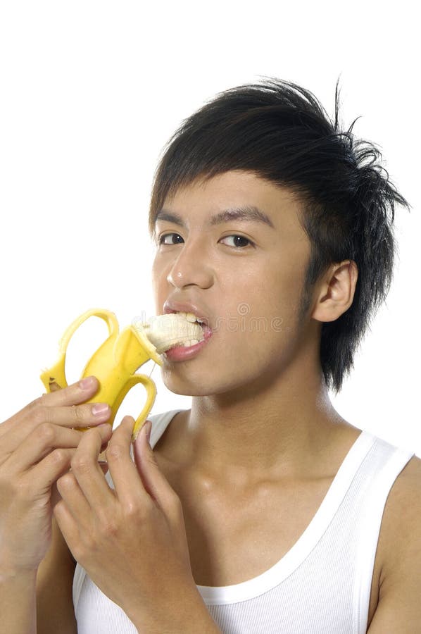 Man Eating Banana stock photo. Image of food, hand, white 4812098