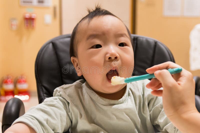 Asian Baby Eating Baby Food Stock Image Image Of Innocence Korean 143614193 free-baby-feeding-chart-by-month-illustrator-pdf-55-off