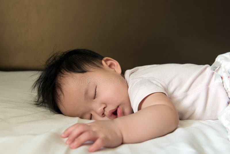 Asian baby sleeping stock image. Image of napping, children 74409429