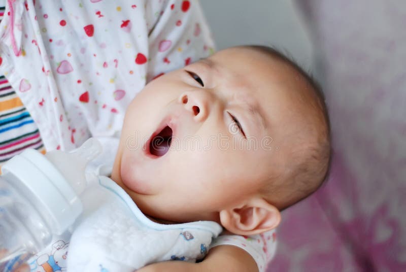 Asian baby yawning