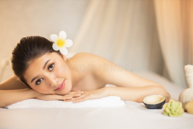 Asian Beautiful Young And Healthy Woman In Spa Salon Massage