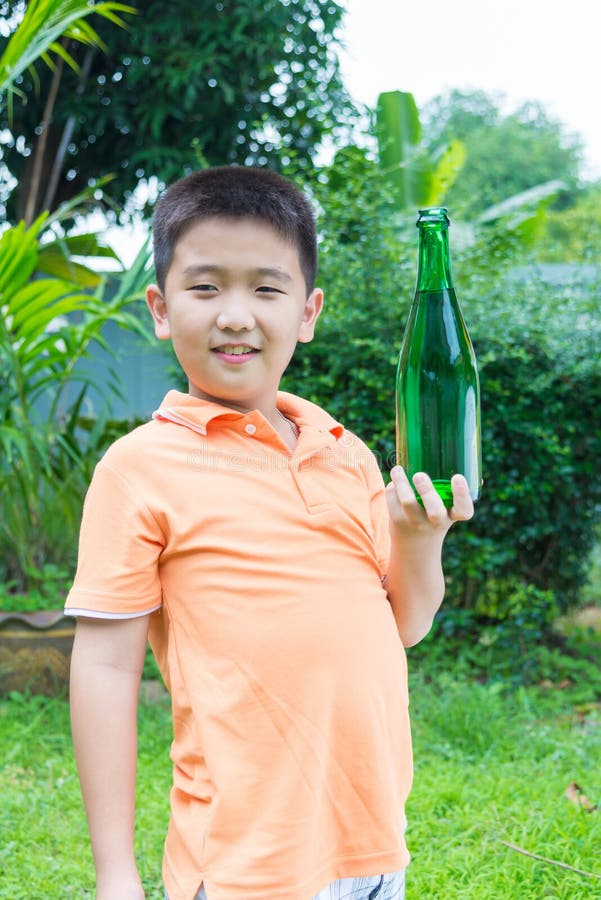 Asian Boy Drinking Water from Green Bottle Stock Photo Image of child