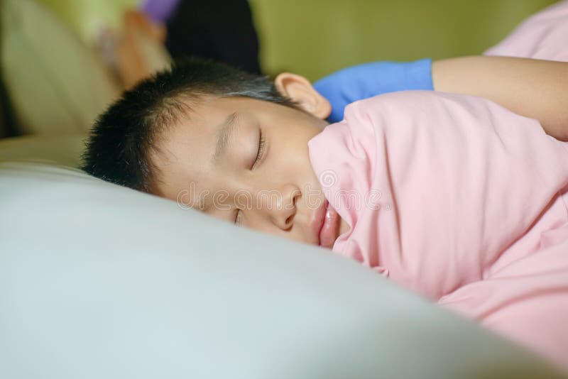 Asian boy sleeping.