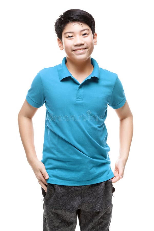 An Asian Boy Wearing a Blue Shirt is Doing Some Gesture Stock Photo
