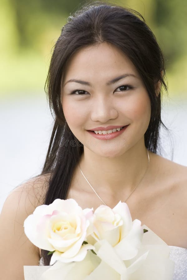 Asian woman in white wedding dress. Thai bride poses before the wedding  day. 6122623 Stock Photo at Vecteezy