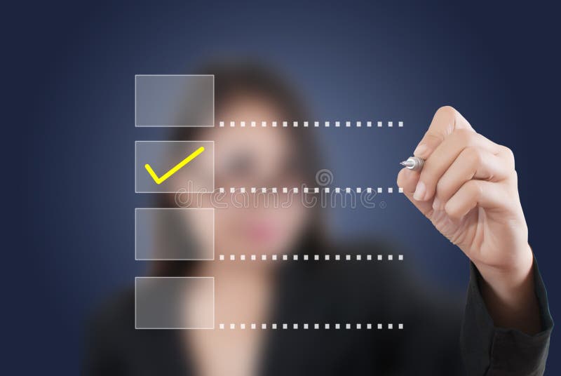 Asian business lady write correct choice. stock photos