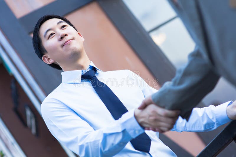 Asian Business Man Shake Hands with Another Business Man stock photos Asian Business Man Shake Hands with Another Business Man stock photos