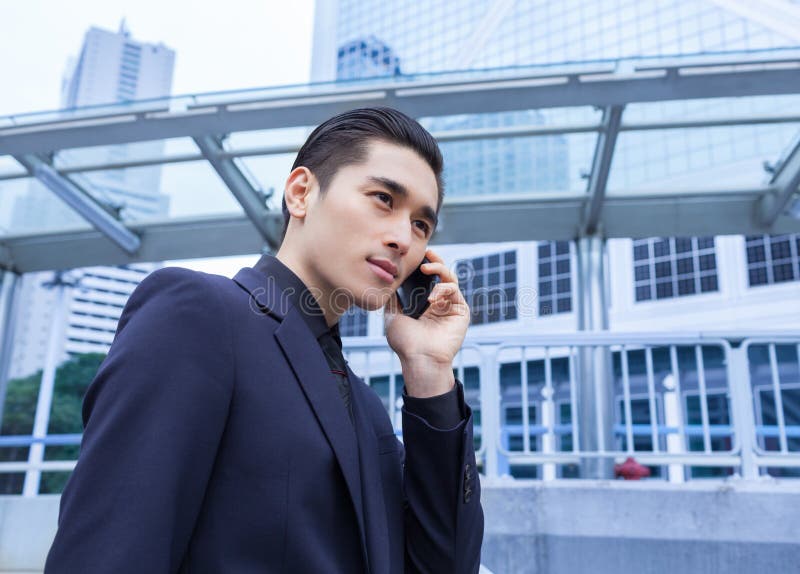 Asian business Man with Smart Phone stock photos