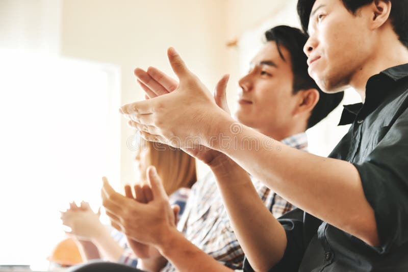 Asian business people clapping hands. stock image Asian business people clapping hands. stock image