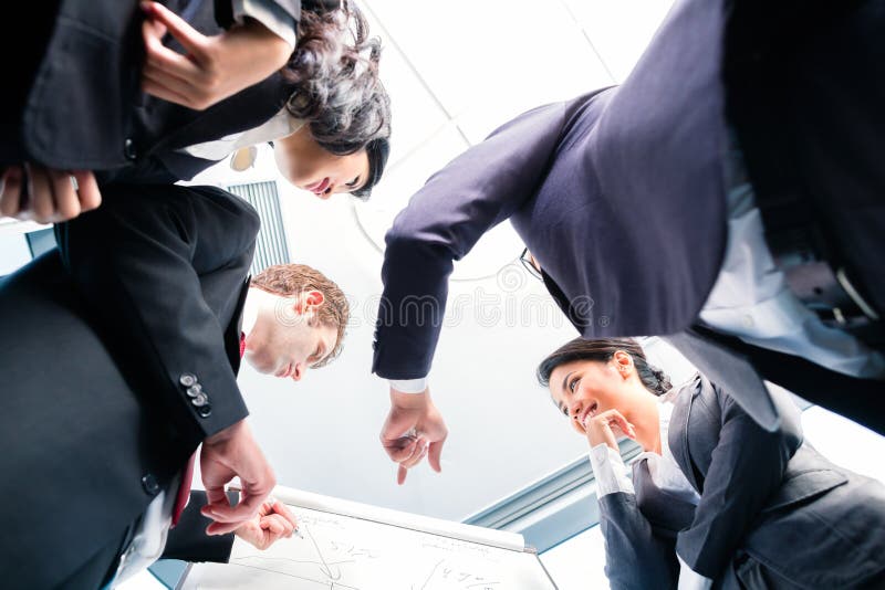 Asian business team in presentation royalty free stock photos Asian business team in presentation royalty free stock photos