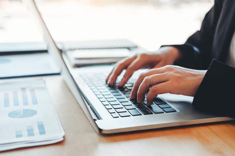 Asian business woman using laptop computer working new project discussing new plan financial graph data stock photo Asian business woman using laptop computer working new project discussing new plan financial graph data stock photo