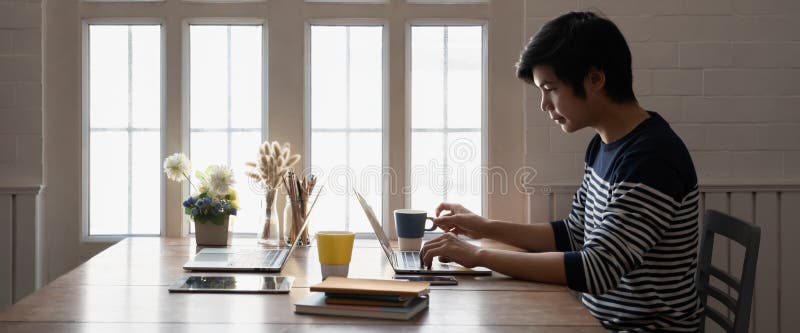 Asian businessman Fund managers analyzing results of research Investment stock market by laptop computer royalty free stock photos