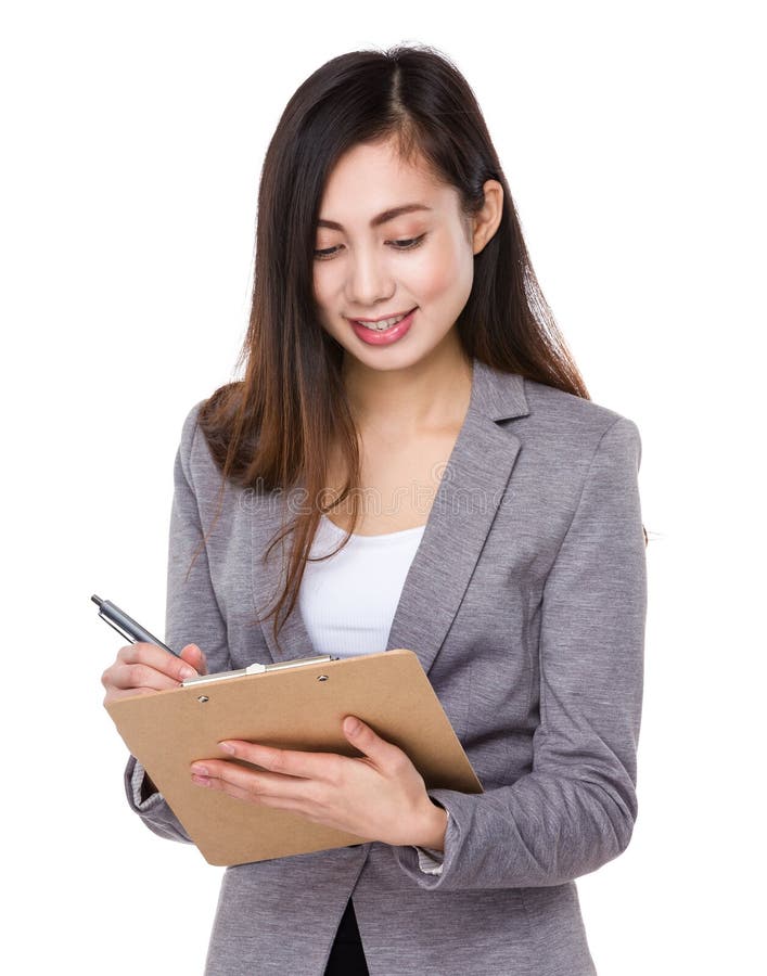 Asian Businesswoman Jotting Note Clipboard Stock Photos - Free ...