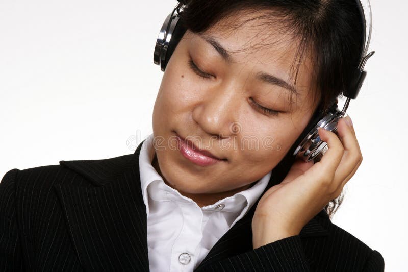 Asian businesswoman listening