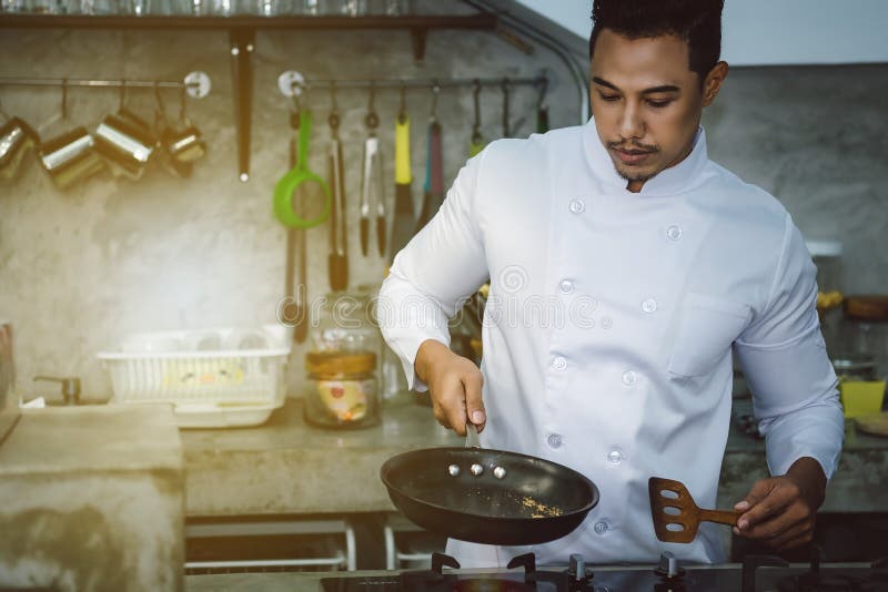 Asian Chefs, Cooking To Be Delicious and Skilled. Stock Image Image