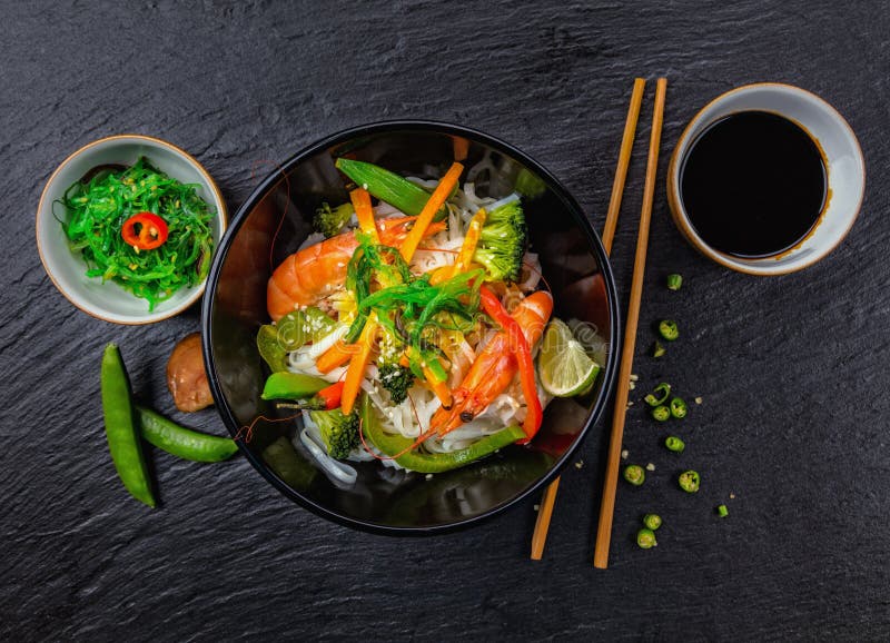 Asian chicken curry and prawns with rice royalty free stock photo