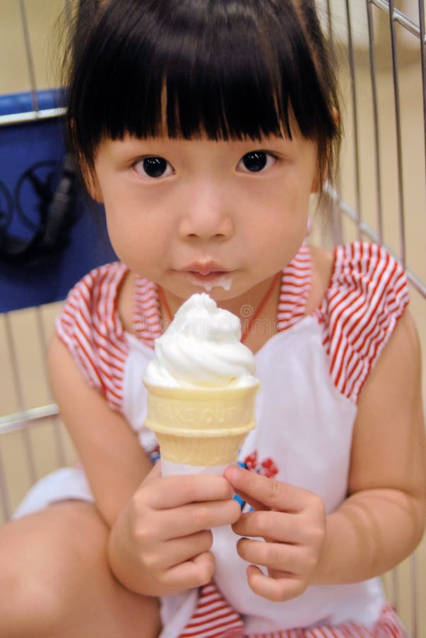 Asian child eating Ice cream