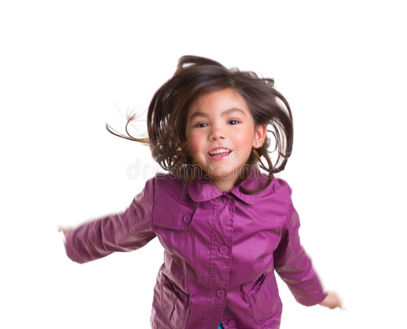 Asian child girl jumping happy with winter purple coat royalty free stock photo Asian child girl jumping happy with winter purple coat royalty free stock photo