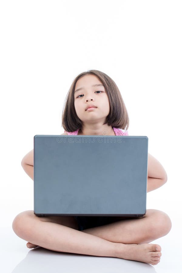 Asian child girl using laptop and boring on white background. Boring kid white stock images, royalty-free photos and pictures