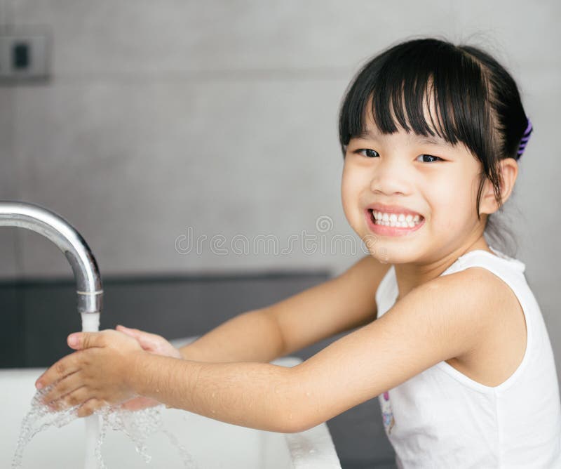 Asian Child Washing Hands