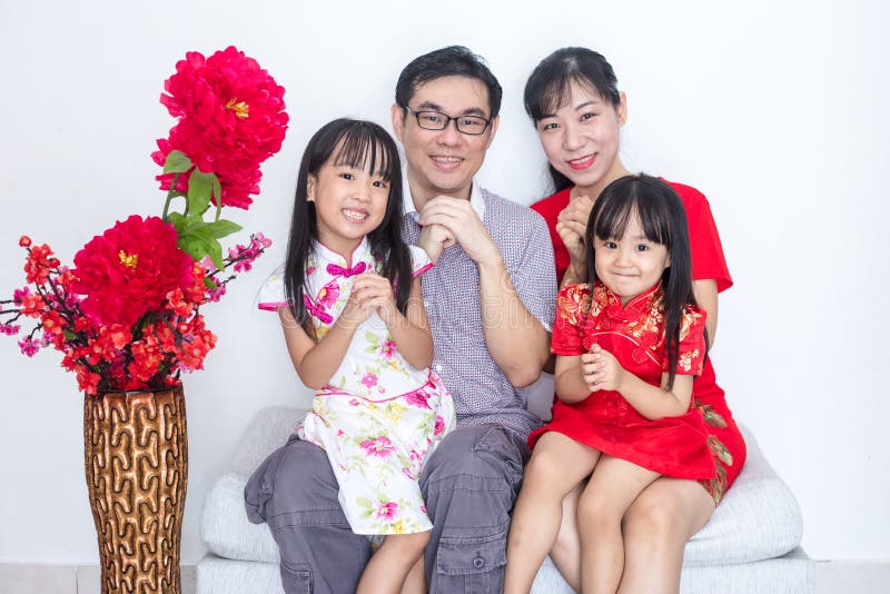 Asian Chinese family with greeting gesture celebrating for Chine