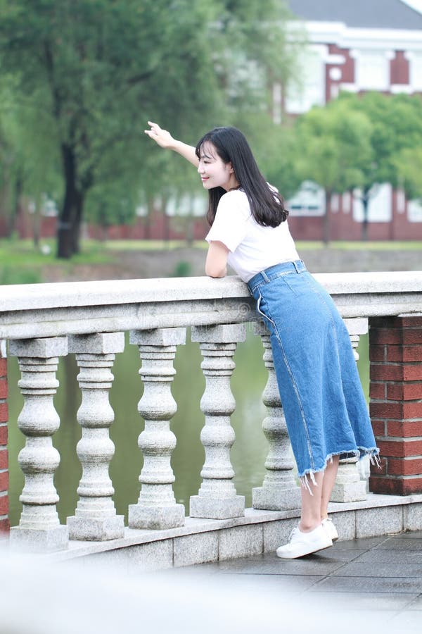 Asian Chinese University Student Enjoy Free Time at Campus Stock Image ...