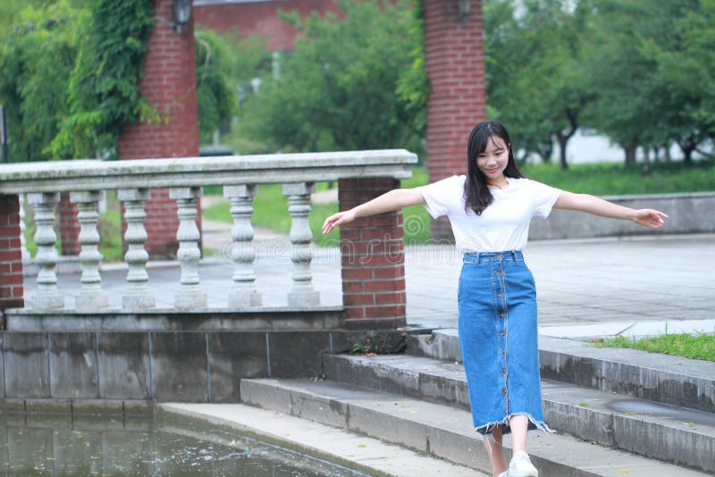 Asian Chinese university student enjoy free time at campus stock photos Asian Chinese university student enjoy free time at campus stock photos