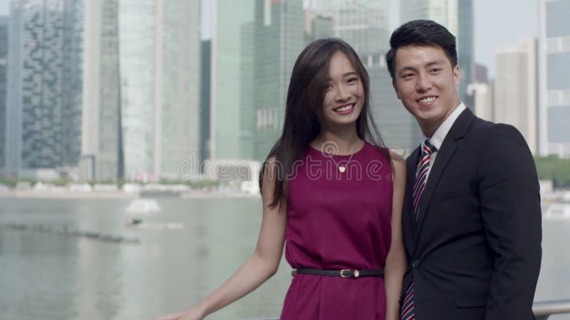 Asian couple in business attire slow motion
