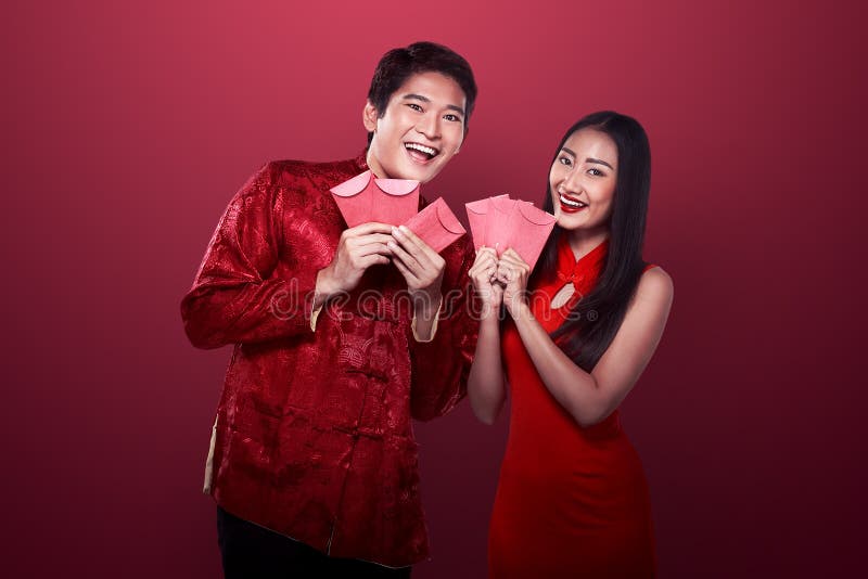 Asian couple in cheongsam suit stock image Asian couple in cheongsam suit stock image