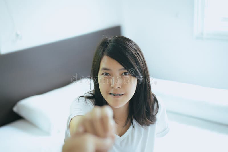 Asian couples lover holding hands to encourage in times of disappointment or life problems together,True friendship concept stock images Asian couples lover holding hands to encourage in times of disappointment or life problems together,True friendship concept stock images