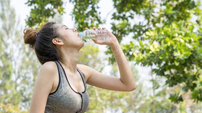 Asian Cute Sport Healthy Fit and Firm Slim Teen Girl Drink Water from  Plastic Bottle on the Hand in Summer Hot Day at Outdoor Stock Image - Image  of health, athlete: 185737425