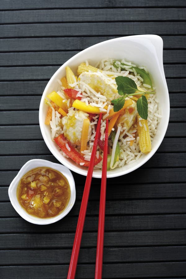 Asian Dish with Chicken, Different Vegetables and Rice Stock Photo