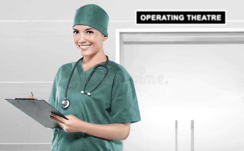 Asian doctor woman with stethoscope holding a clipboard on the operating theater stock photos Asian doctor woman with stethoscope holding a clipboard on the operating theater stock photos