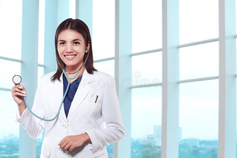 Asian Doctor woman with stethoscope standing royalty free stock photos Asian Doctor woman with stethoscope standing royalty free stock photos