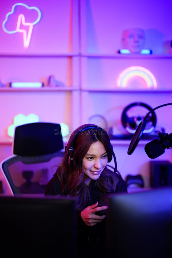 Asian Cute Girl Streaming Play Game Online Using Controller and Talking  with Fan Club from Microphone and Headset in Gamer Neon Stock Photo - Image  of internet, cheerful: 282549384