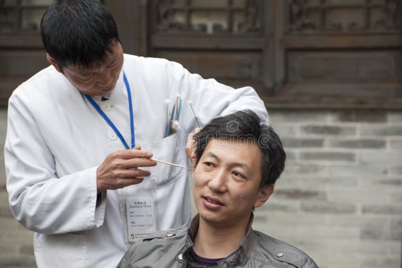 Asian Ear Picker Cleaning Ear Editorial Stock Photo Image of picks, earwax 37519733