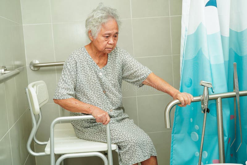Asian Elderly Old Woman Patient Use Toilet Support Rail in Bathroom ...