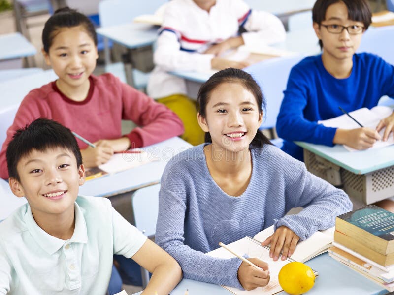 Asian elementary students in class royalty free stock images