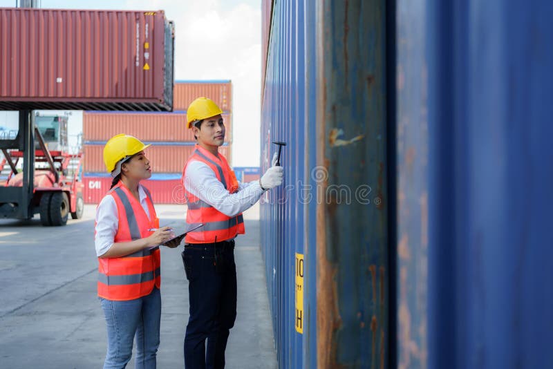 Asian Engineer or Foreman Using Chipping Hammer Tool for Checking the