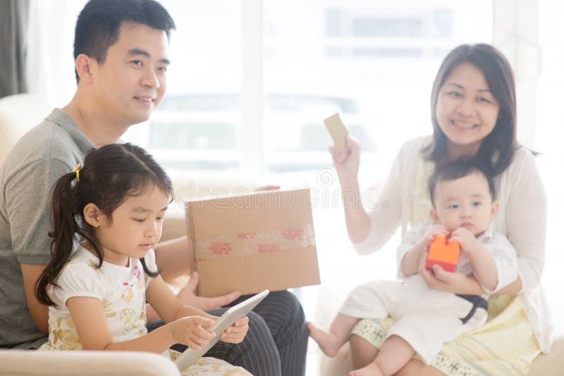 Asian family online purchase stock photo Asian family online purchase stock photo