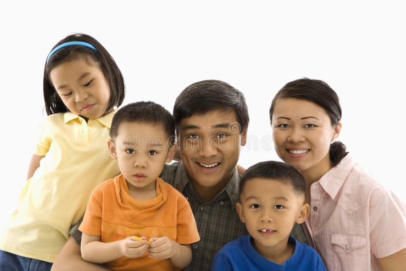 Asian family portrait against white background. Asian family portrait against white background.