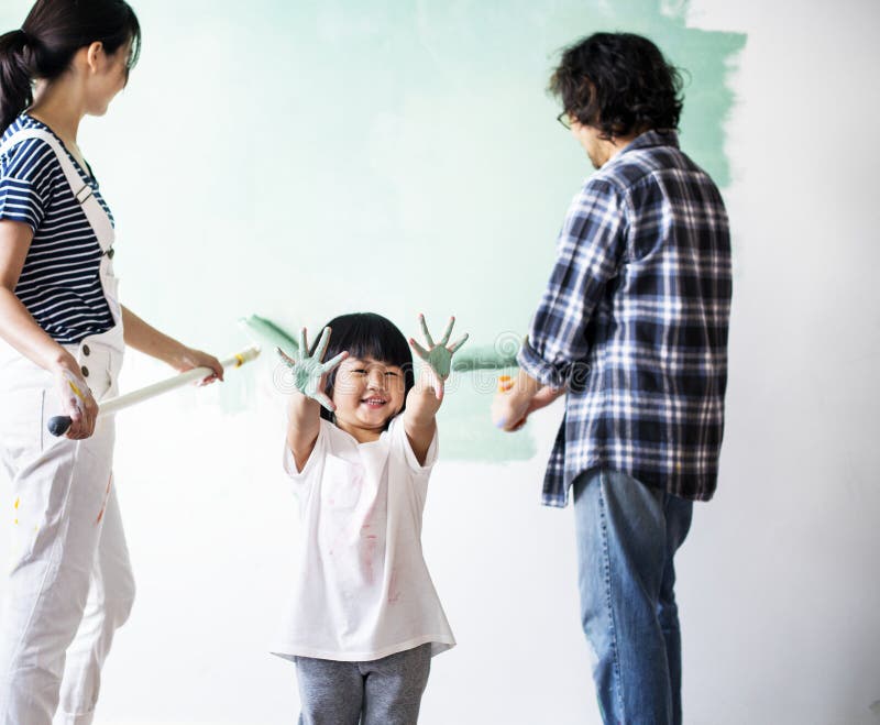 Asian family renovating the house royalty free stock photos