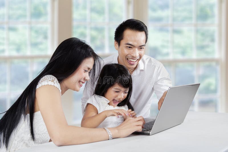 Asian family surfing internet
