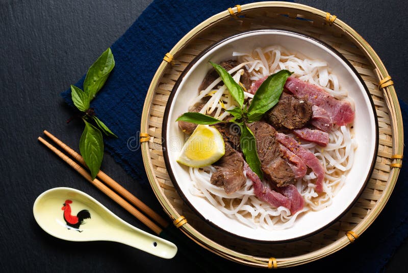 Asian food concept vietnamese pho noodles on black background with copy space