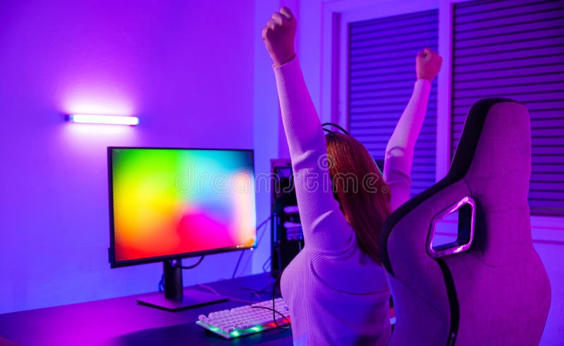 Premium Photo  Gamer playing online game on pc in dark room.