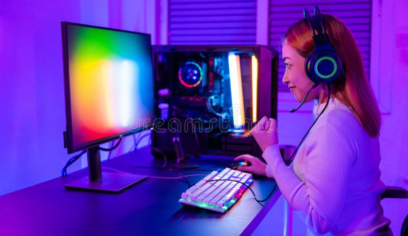 Premium Photo  Gamer playing online game on pc in dark room.