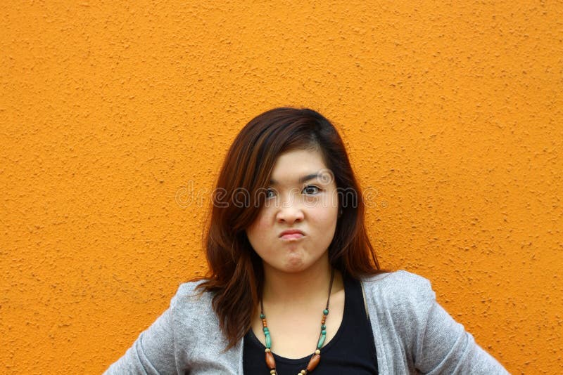 An asian girl with angry face