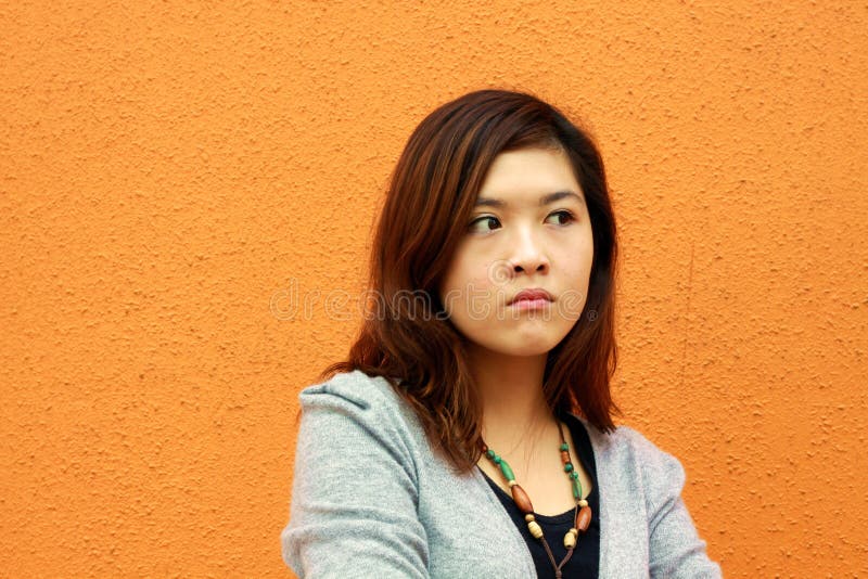 An asian girl with angry face