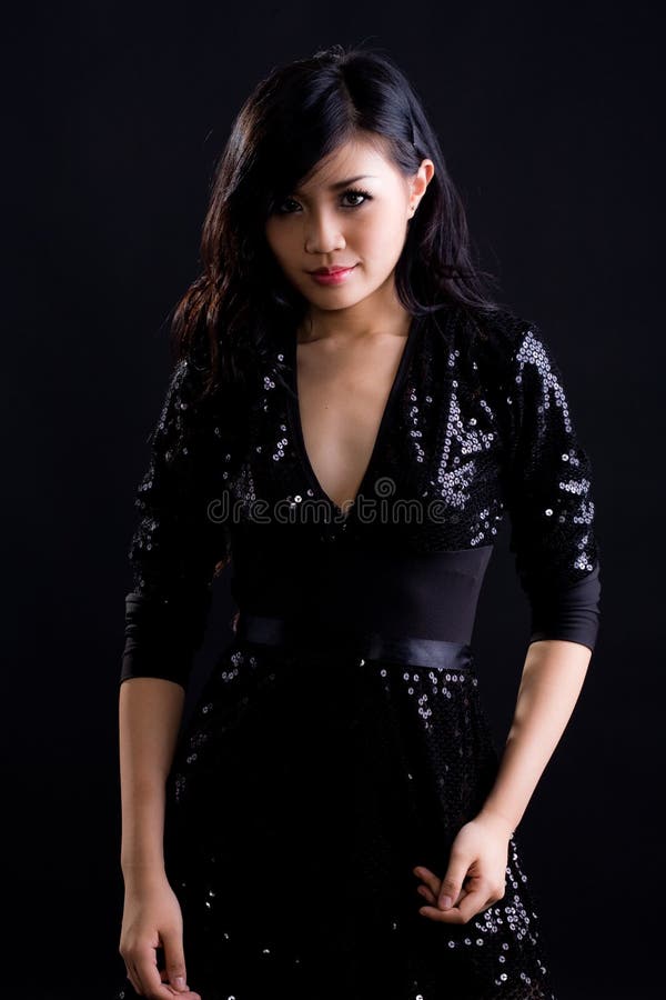 Asian girl in black cocktail dress